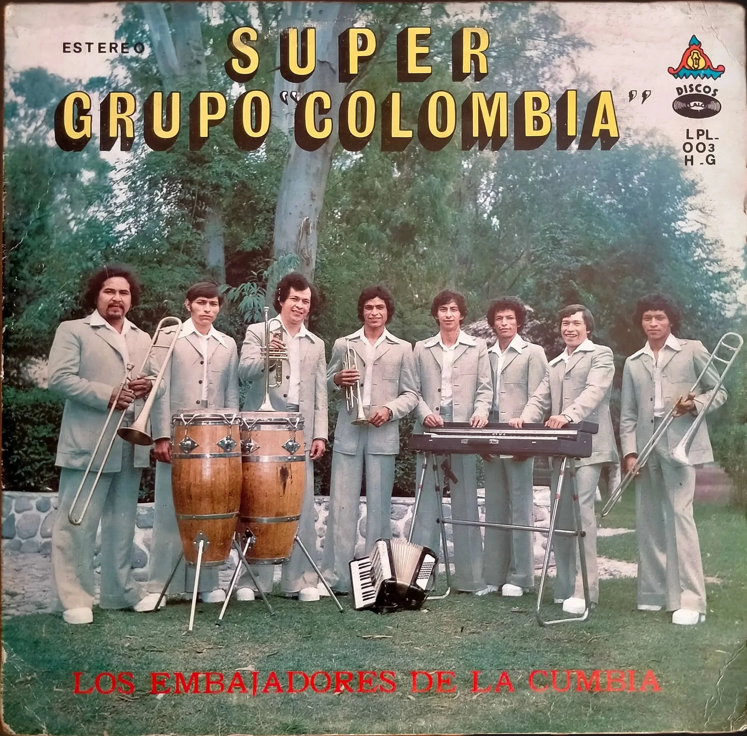 An image of the vinyl album cover by the band Super Grupo Colombia (showing themselves in fancy beige suits and musical instruments on the grass and under a big tree)